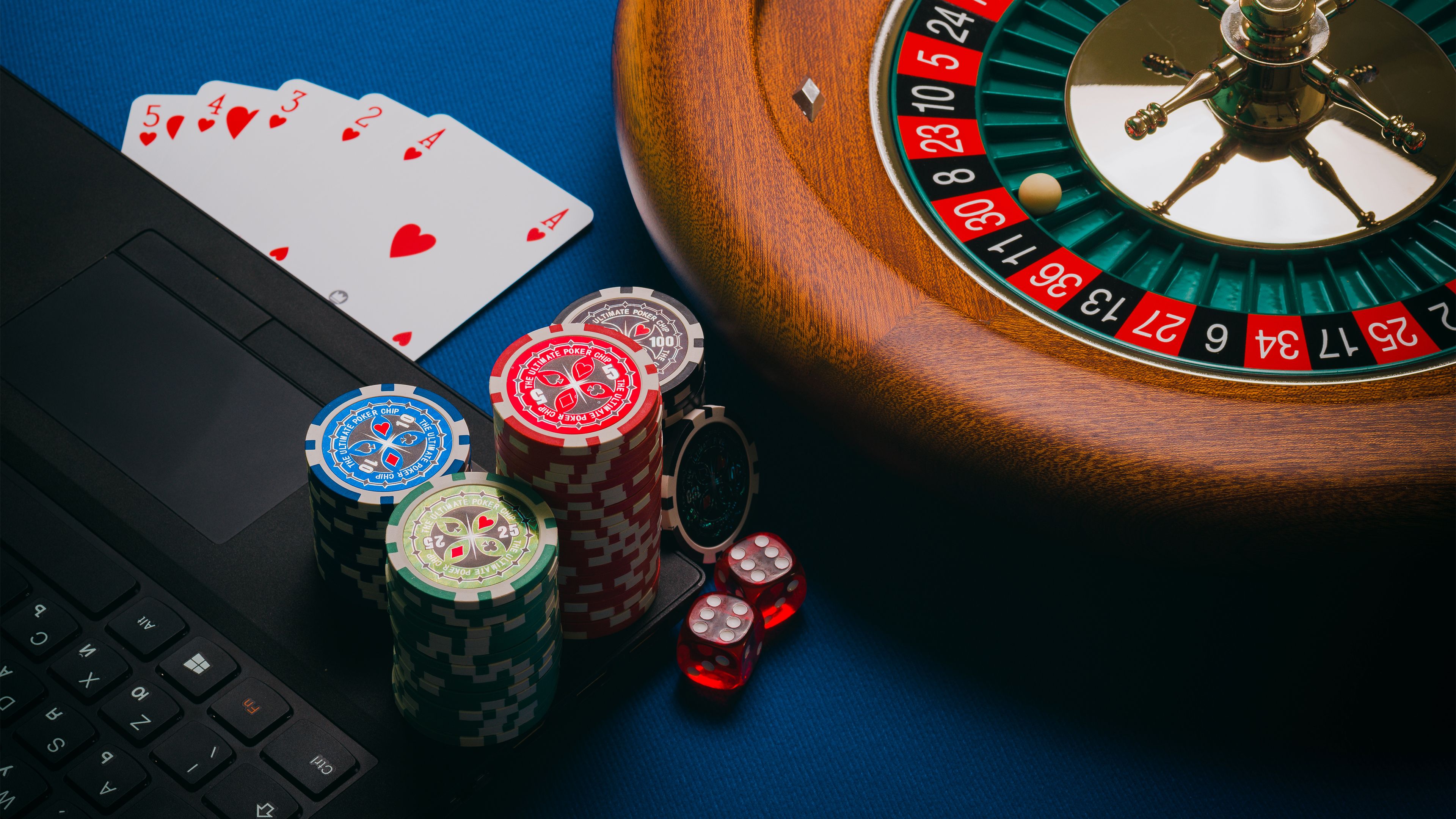 Close-up casino table with cards and chips for sister-site research context