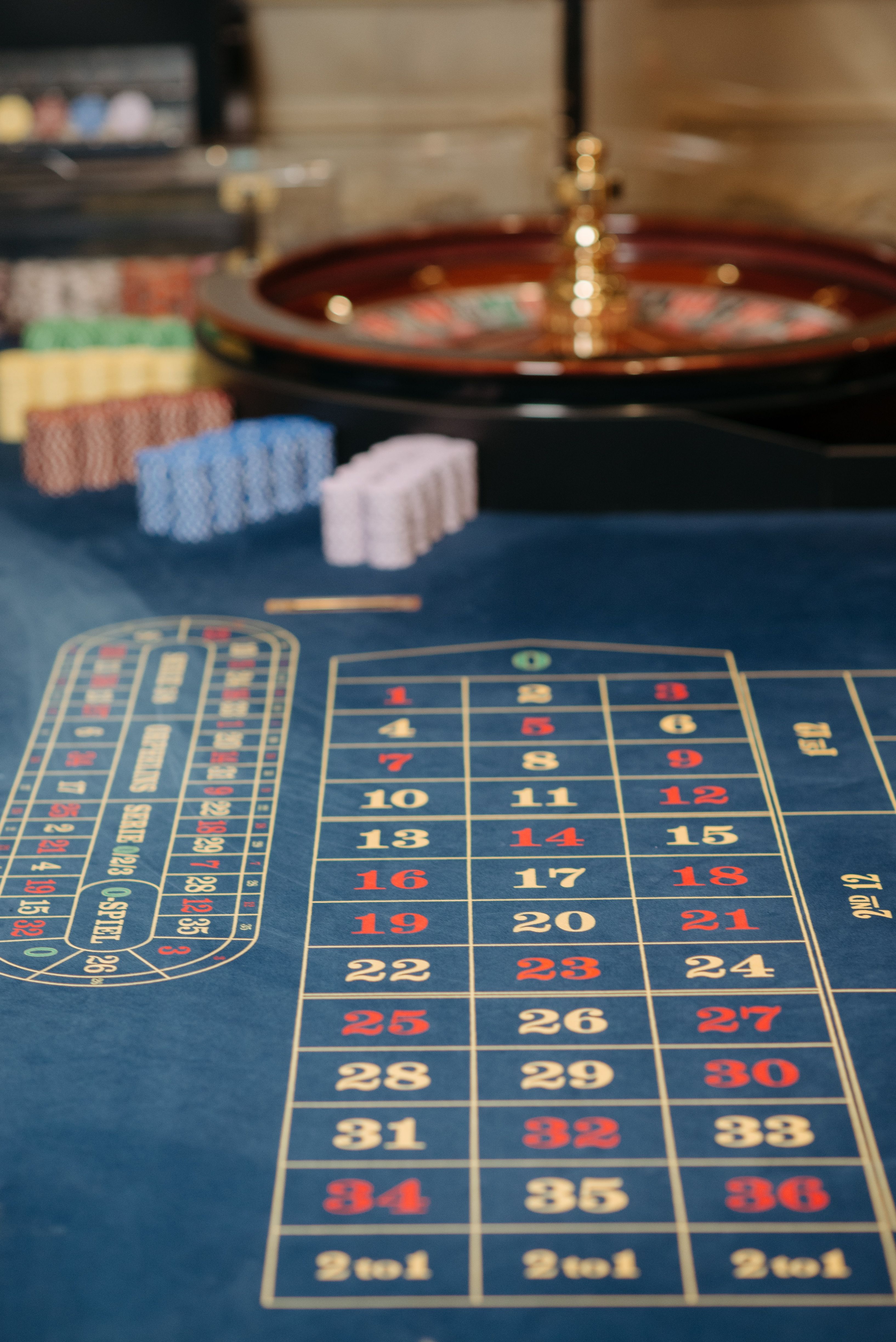 Roulette table with colourful casino chips for offer and network review context